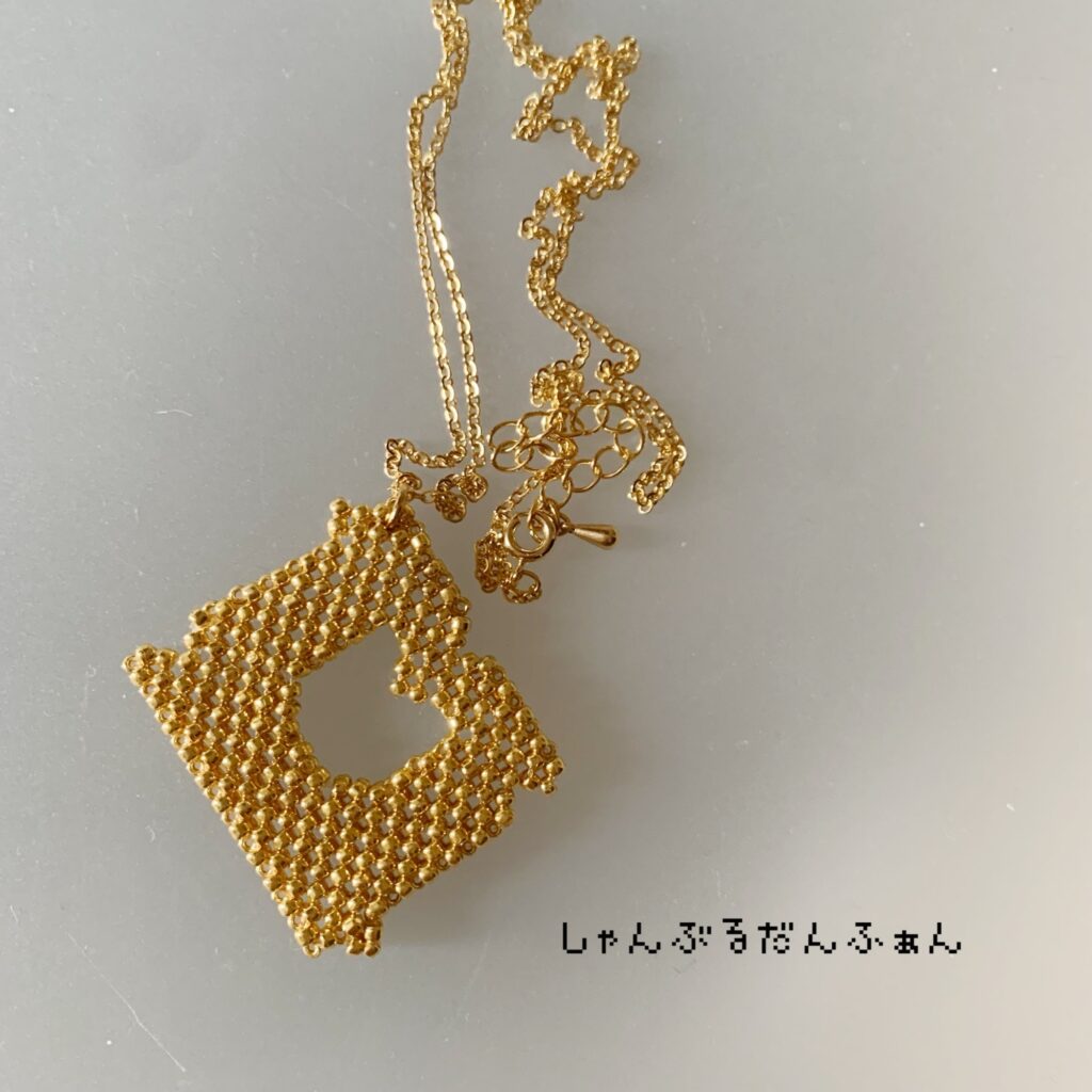 金のバッグクロージャー厚みありネックレス